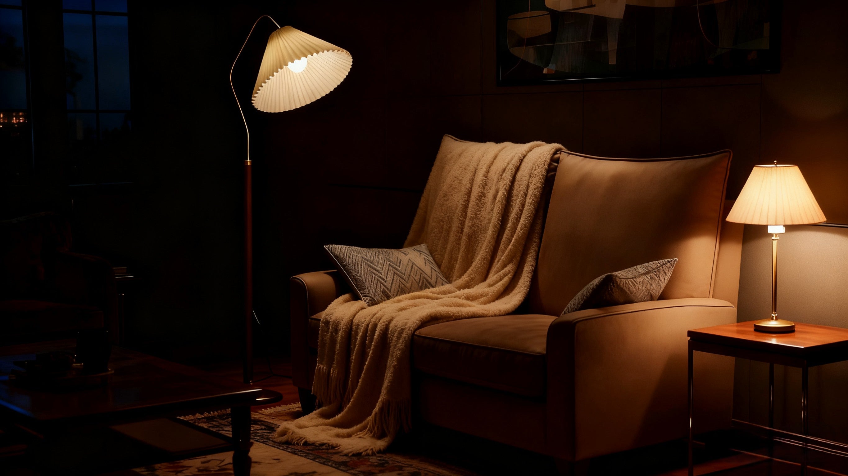 Cozy living room with a brown sofa, blanket, and Homira lamps creating a warm atmosphere.