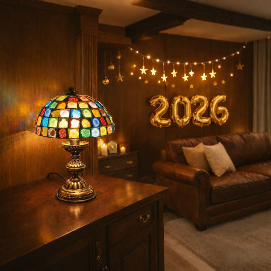 Decorative Homira block lamp on a wooden cabinet with '2026' balloons in a cozy living room.